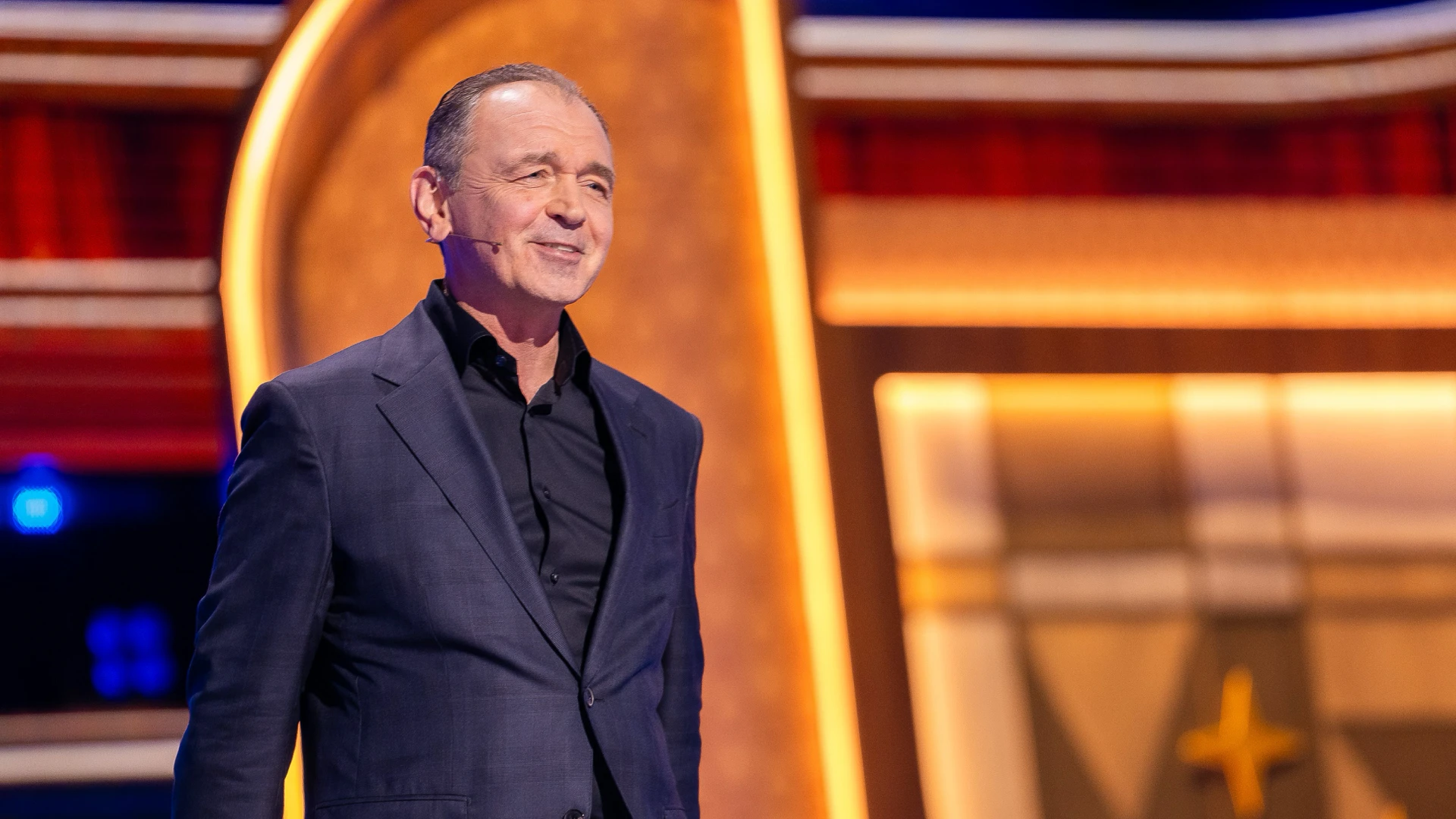 Disney Experiences Chairman Thomas Mazloum speaking on stage at D23 2026. | CREDIT: Disney