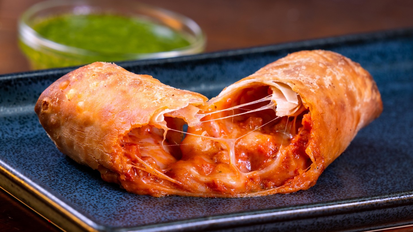 Pepperoni Pizza Egg Roll with pesto dipping sauce. Photo: ©Disney.