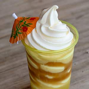 DOLE Whip® Float with a Splash of Rum
