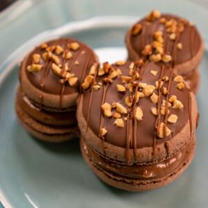 Mickey-shaped Macaron made with SNICKERS® bar pieces