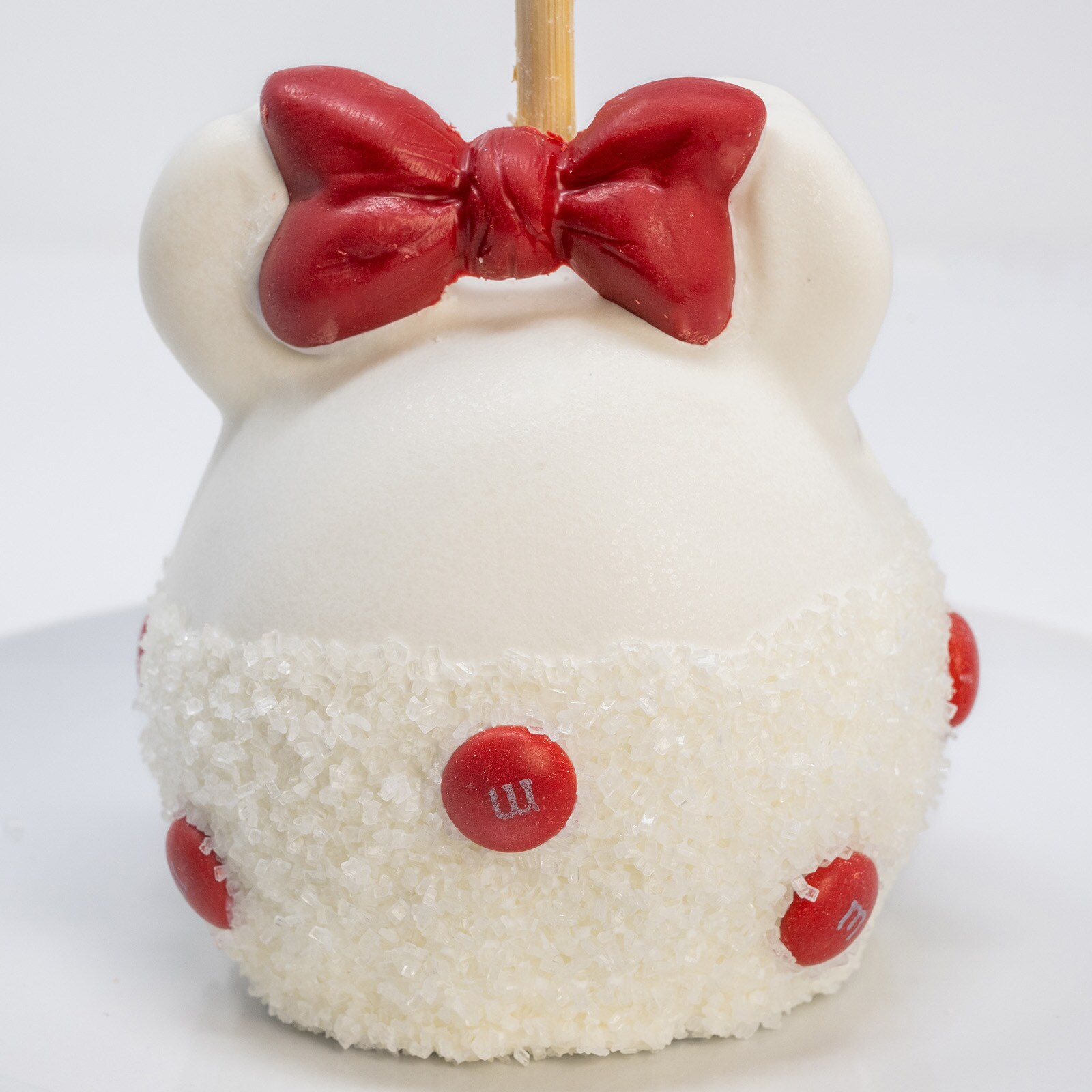 Minnie Holiday Caramel Apple with M&M’S® Milk Chocolate Candies