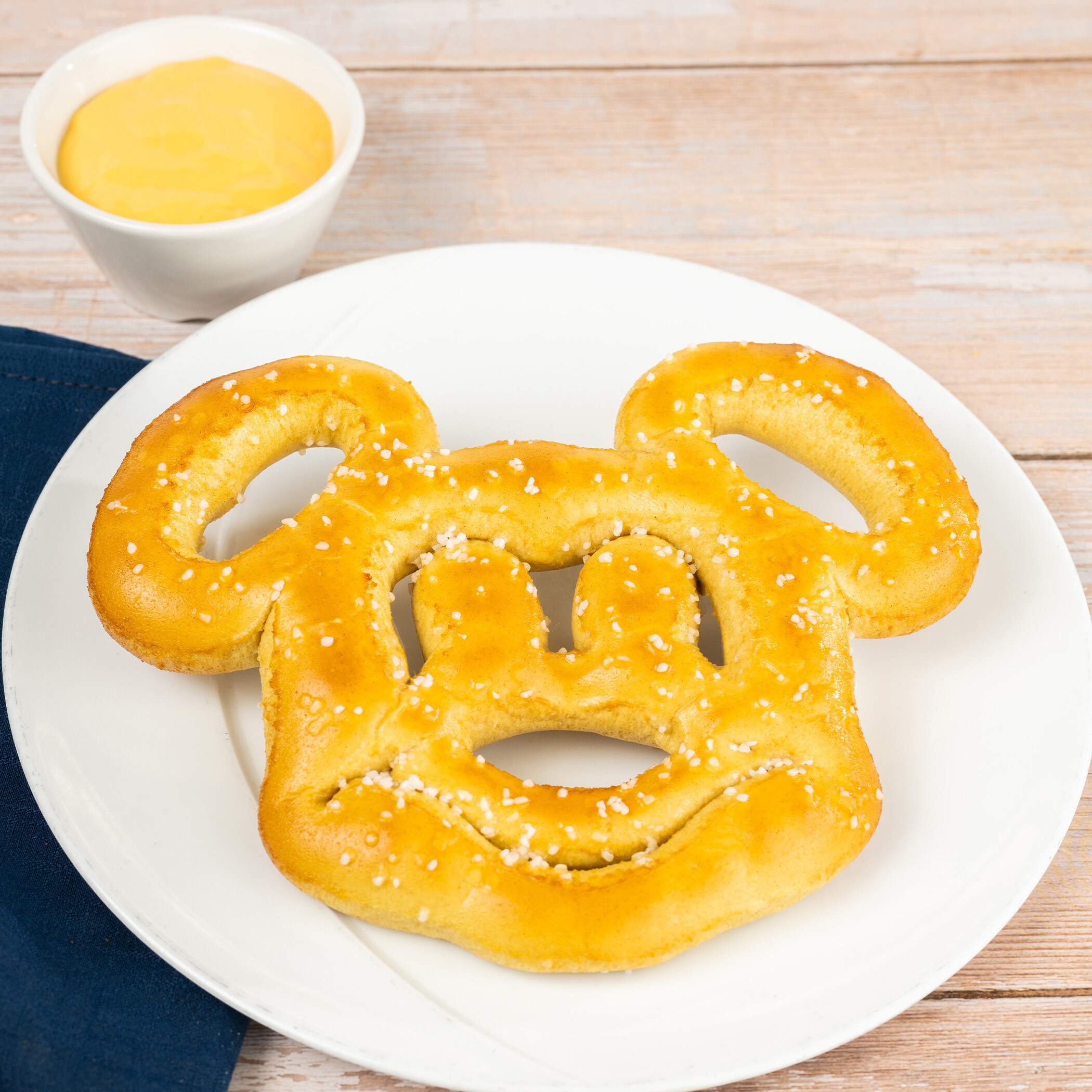 Mickey-shaped Pretzel with Cheese Sauce